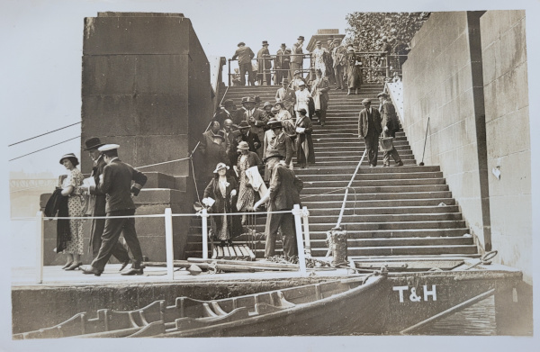 Members of the Middle Temple and the Inner Temple at the Temple Landing Stage waiting to embark on a boat trip, 21 July 1934 (MT/7/EVE/20)