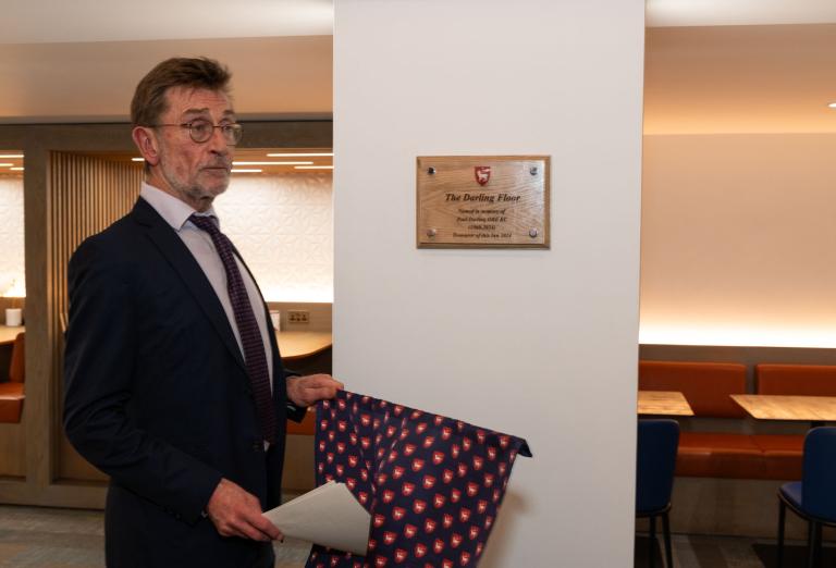 The plaque is unveiled