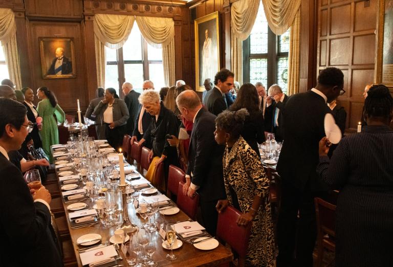 Guests being seated at dinner